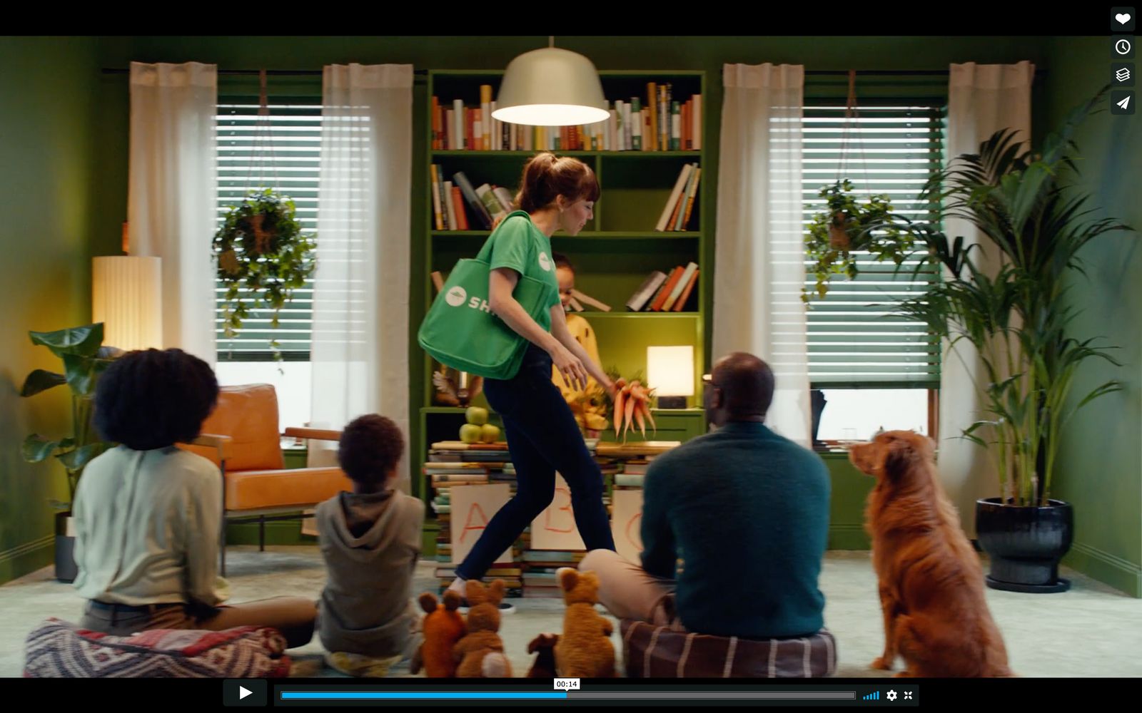 a group of people sitting around a living room