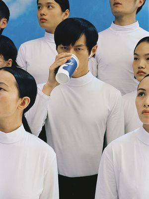 a group of people standing next to each other