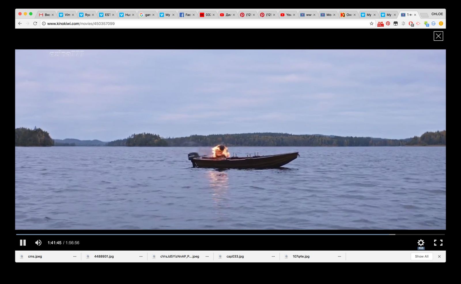 two people in a boat on a lake