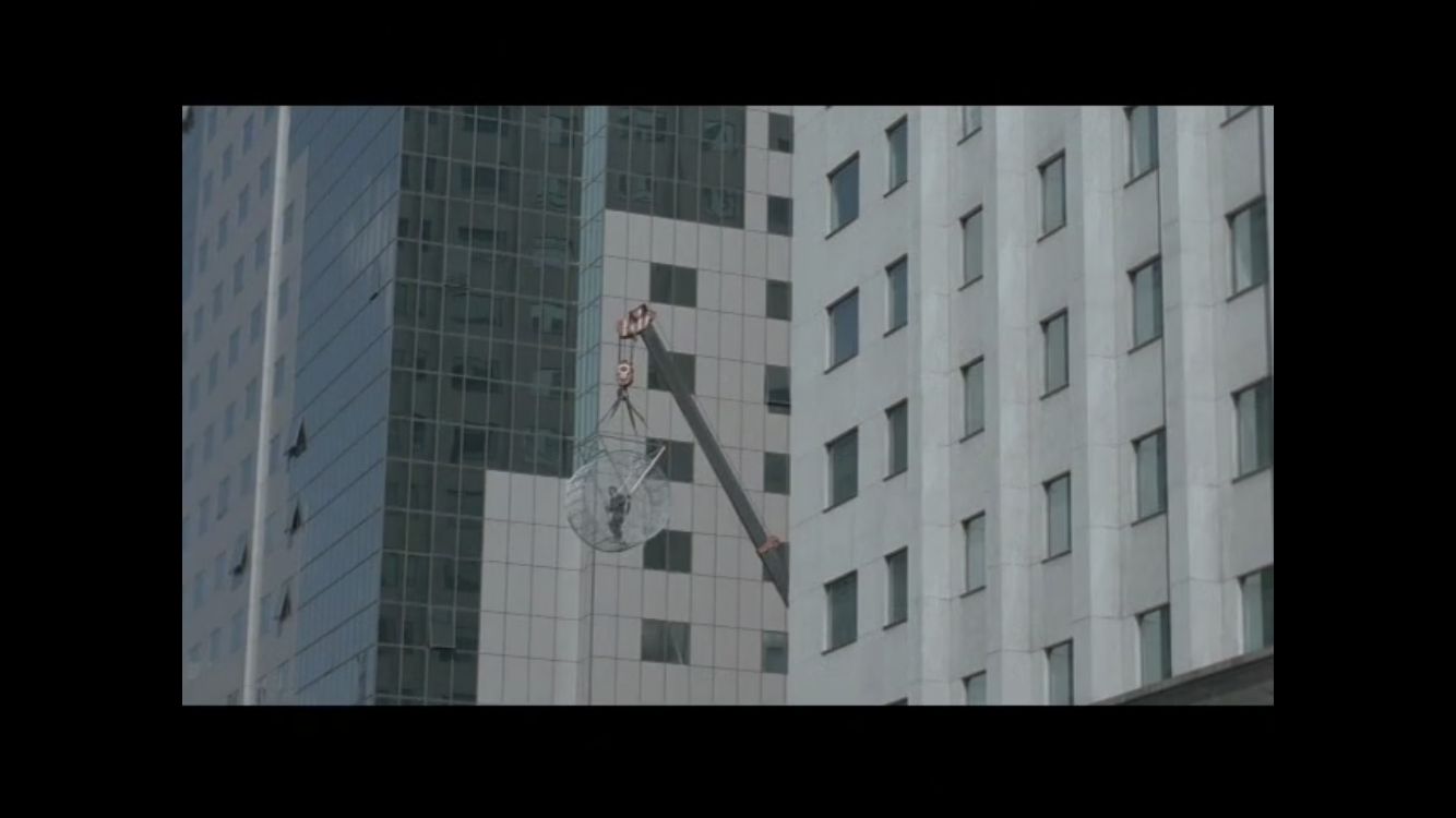 a tall building with a clock on the side of it