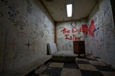 a room with graffiti all over the walls