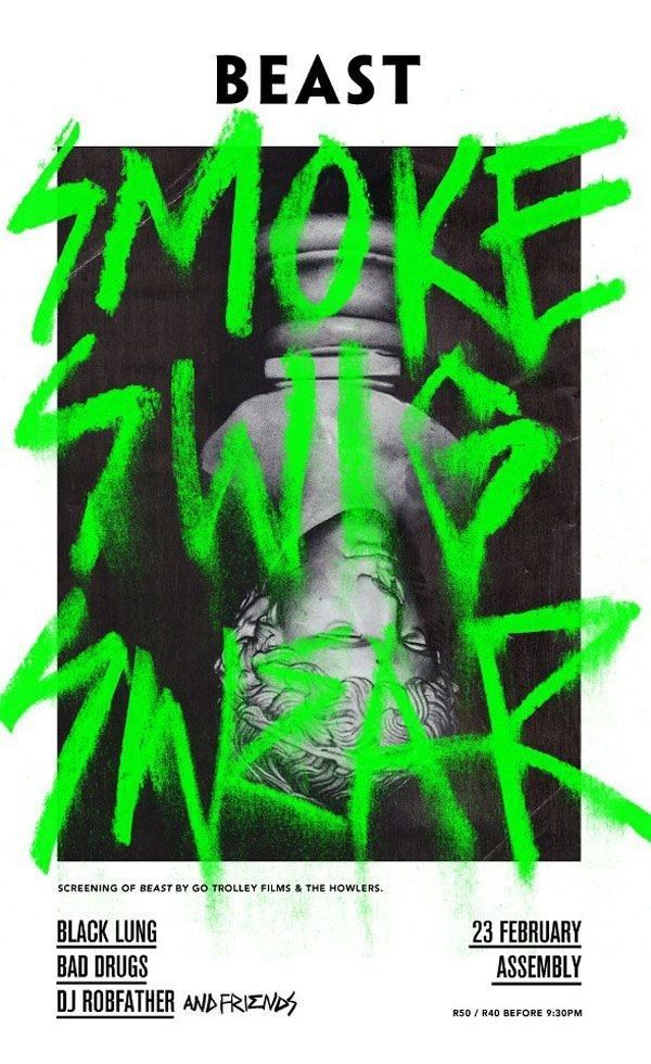 a poster with green spray paint on it