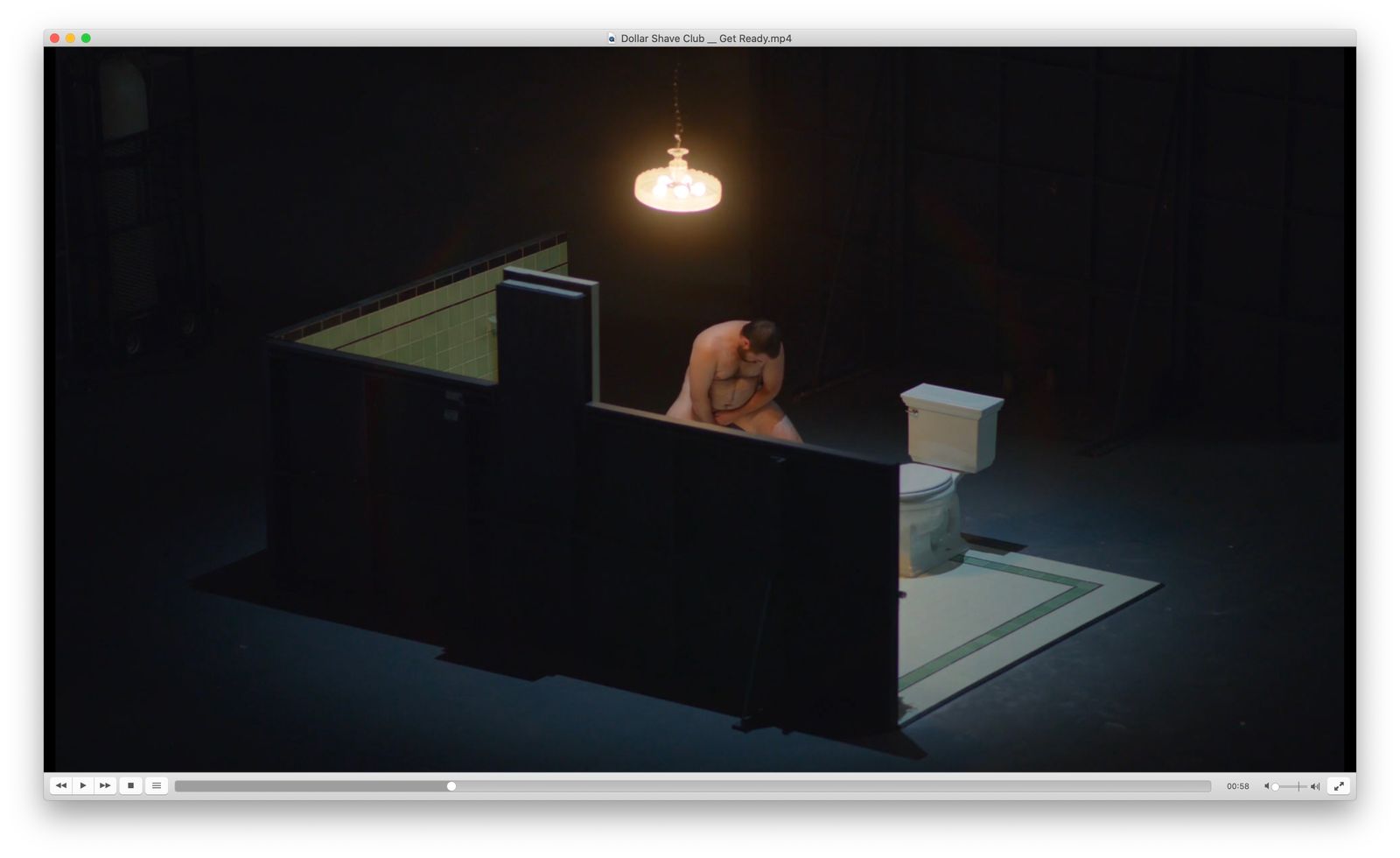 a woman sitting in a bathtub in the dark