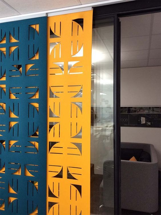 a couple of yellow and blue dividers in an office