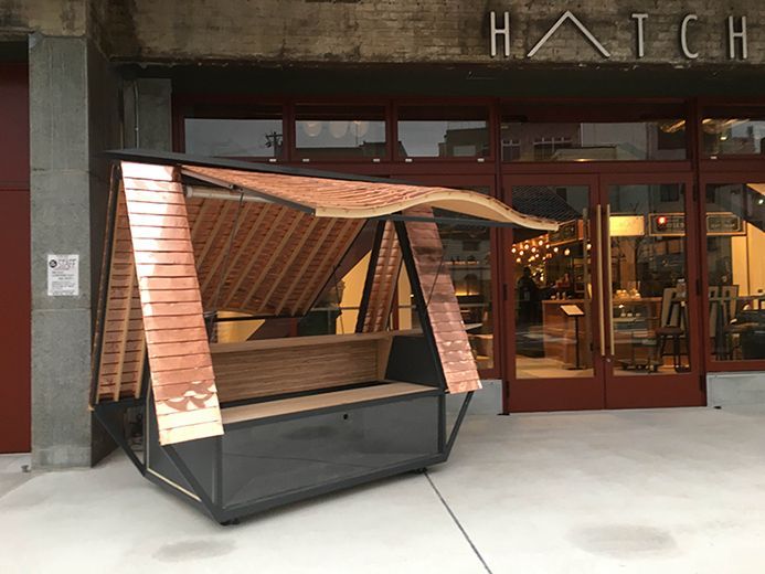 a bench sitting in front of a building