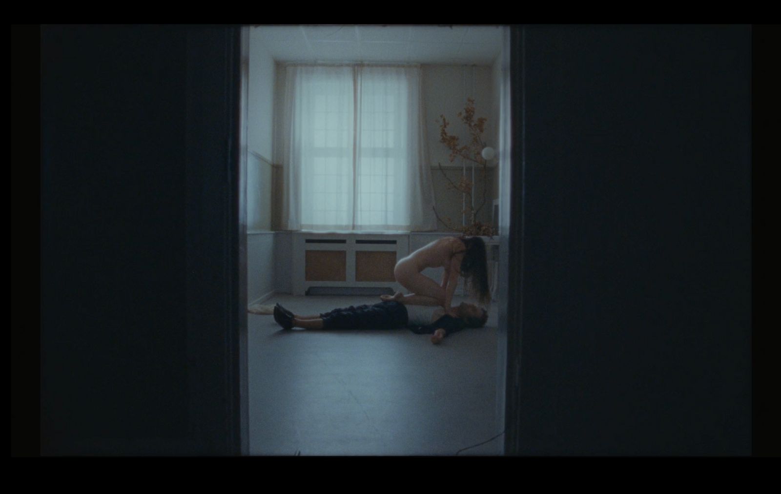 a person laying on the floor in a room