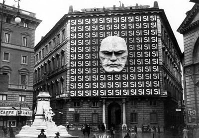 a building with a giant face on the side of it