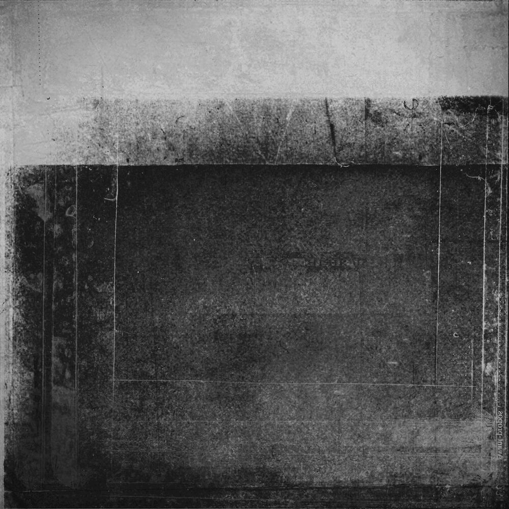 a black and white photo of a square