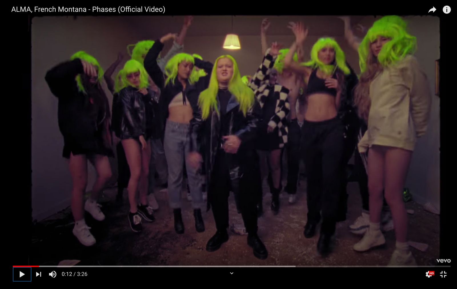 a group of people with neon green hair