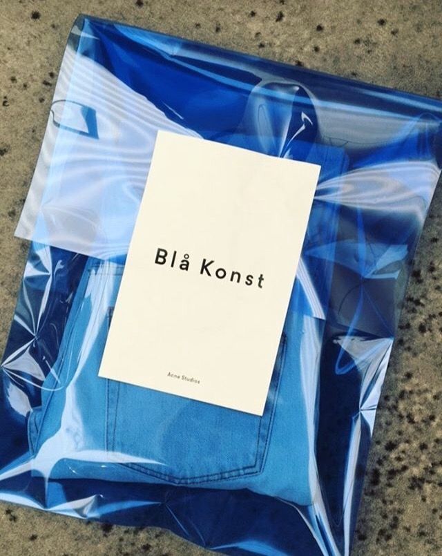 a blue plastic bag with a label on it