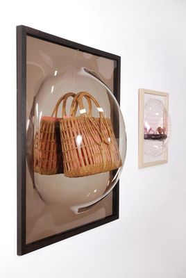 a couple of baskets hanging on a wall