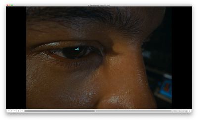 a close up of a person's eye with a blurry background