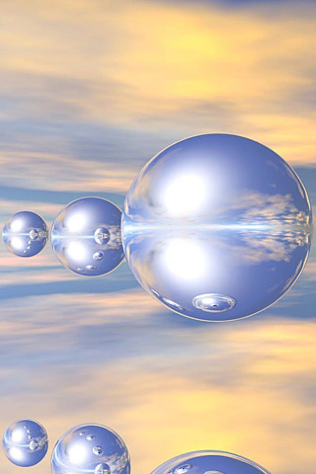 a group of spheres floating in the air