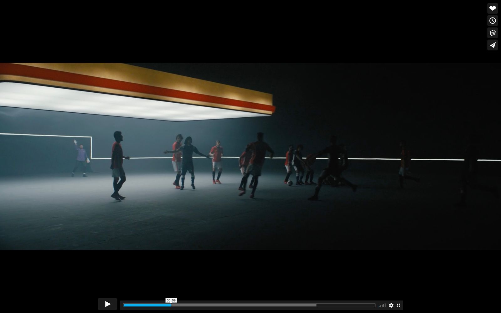 a group of people standing in a dark room