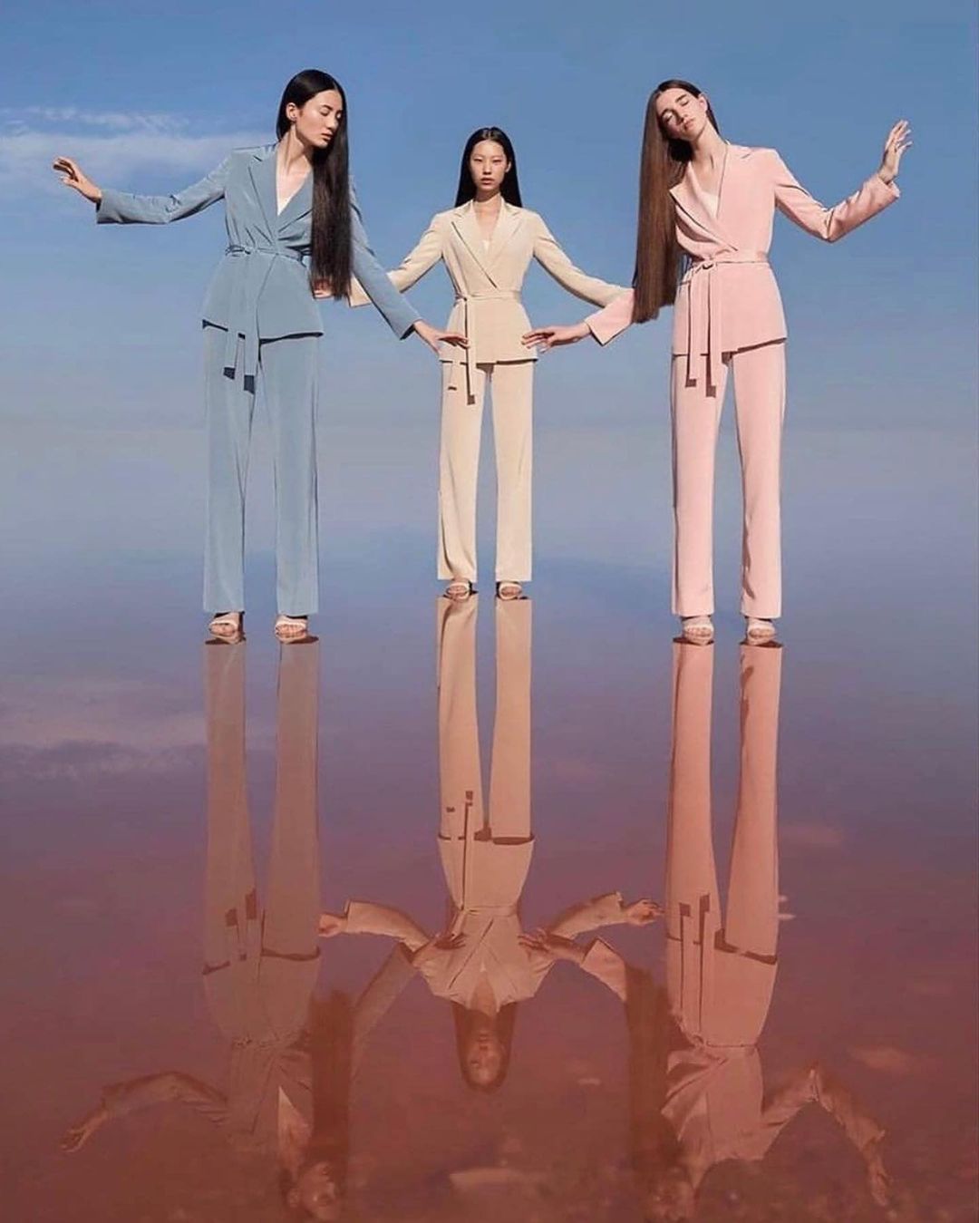 a group of women standing next to each other