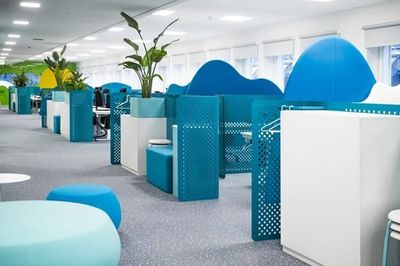 a room filled with blue and white furniture