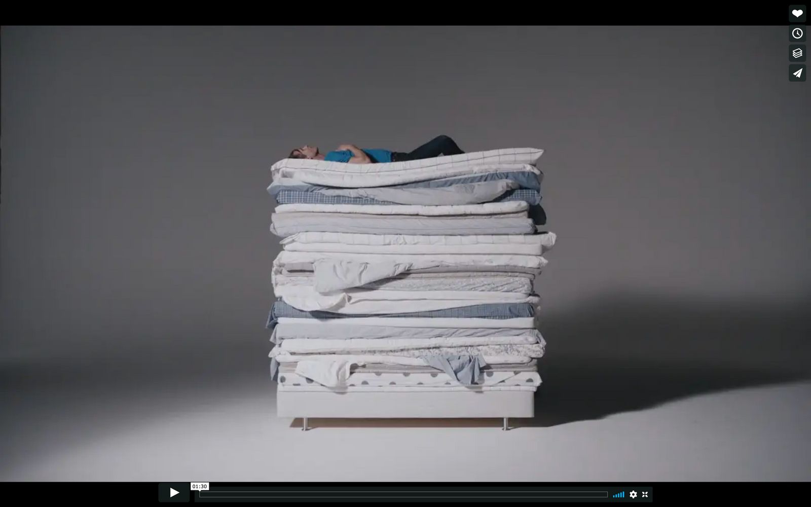 a stack of folded clothes sitting on top of each other