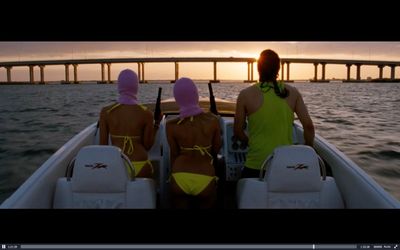 a couple of people in a boat on a body of water