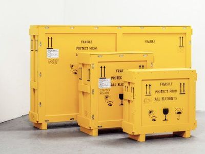 a group of yellow containers sitting next to each other