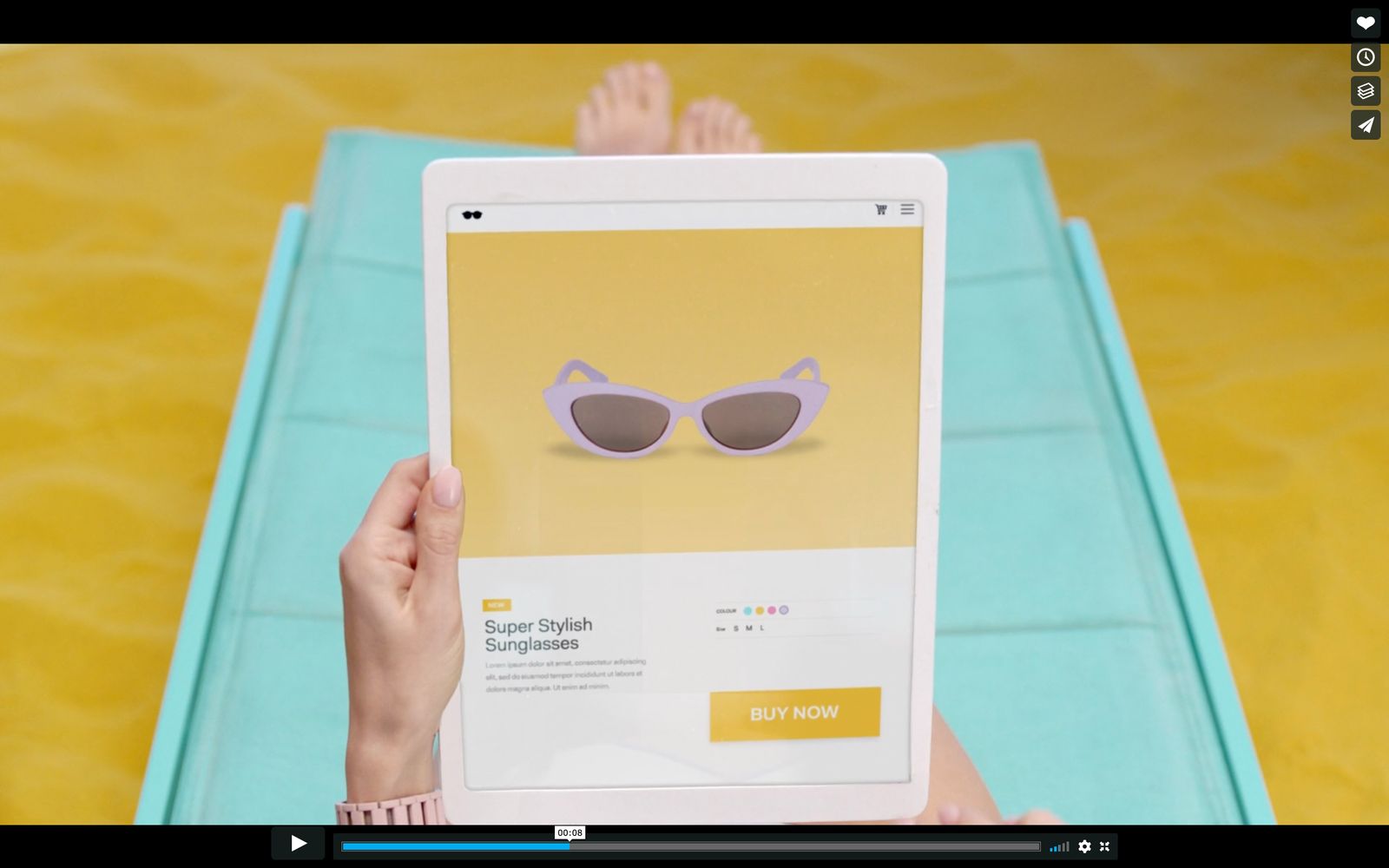 a person holding up a tablet with a pair of sunglasses on it