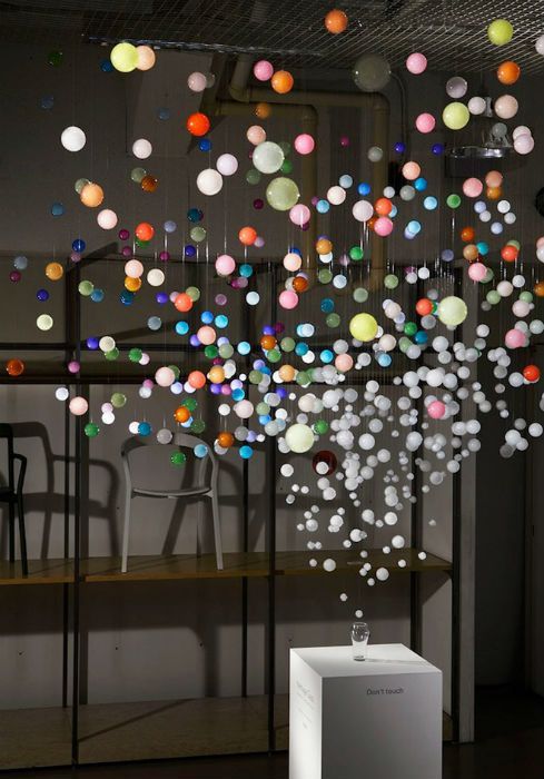 a room filled with lots of different colored balls