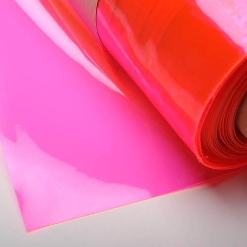 a close up of a roll of pink vinyl