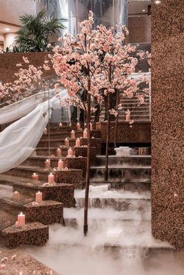 a bunch of candles that are on some steps