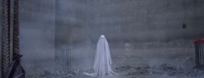 a ghost standing in the middle of a room