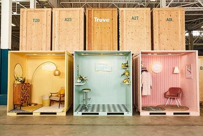 a group of different colored boxes sitting on top of a floor