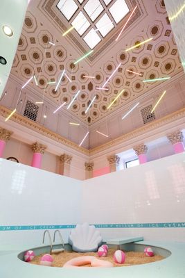 a bath room with a bath tub and a ceiling