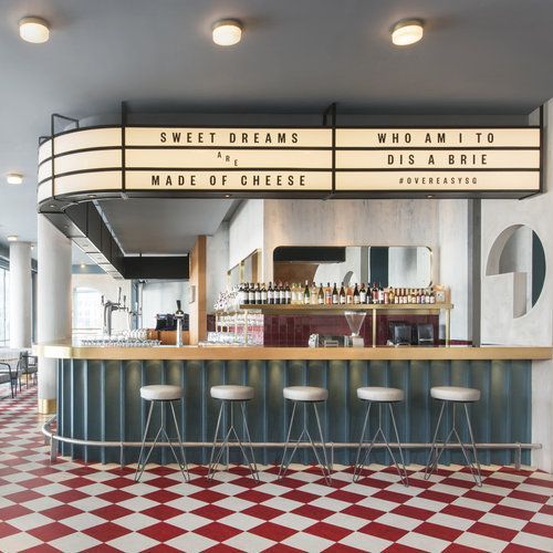 a restaurant with a red and white checkered floor