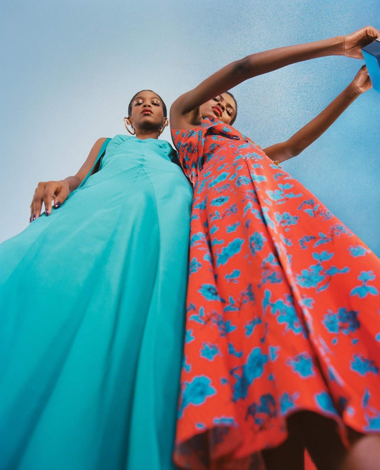 a couple of women standing next to each other