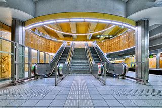 an escalator in a building with a bunch of escalators