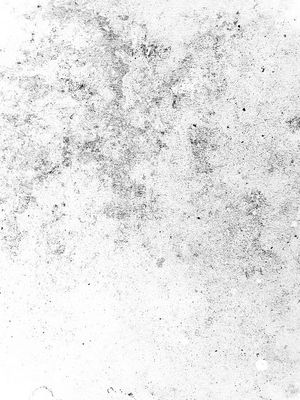 a black and white photo of a dirty surface