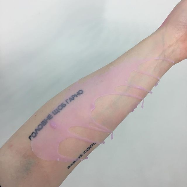 a person's arm with a tattoo on it