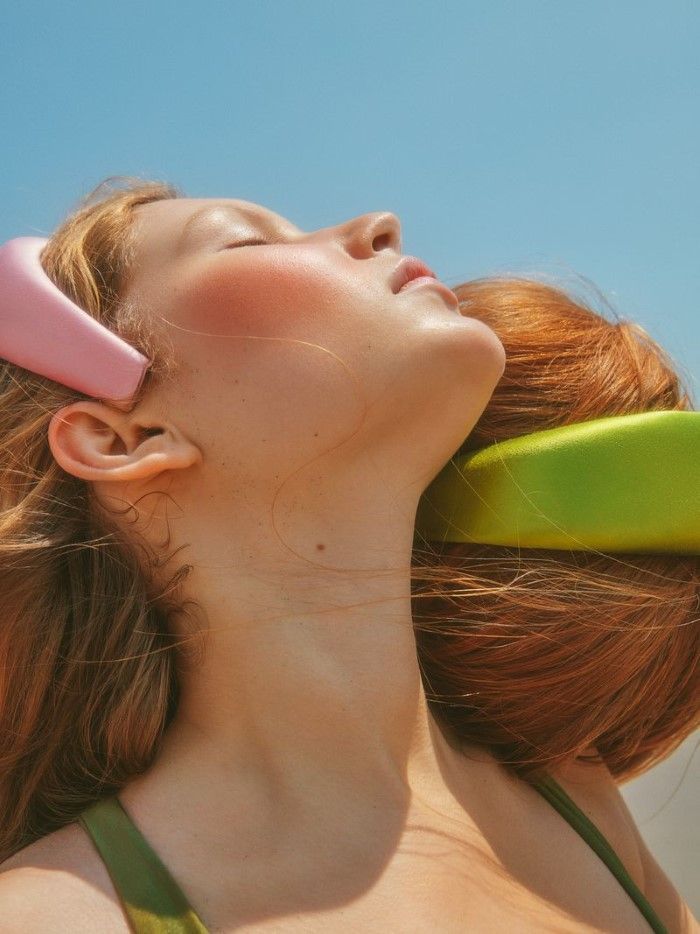 a woman with a hair brush in her hair