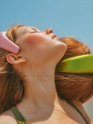 a woman with a hair brush in her hair