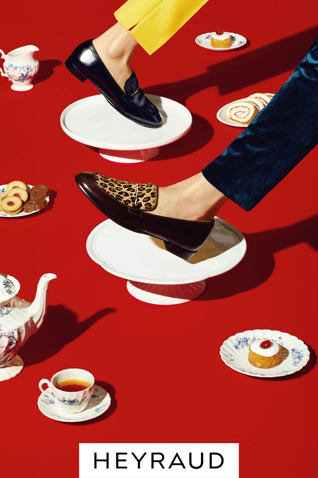 a woman's feet on a plate with a cup of tea