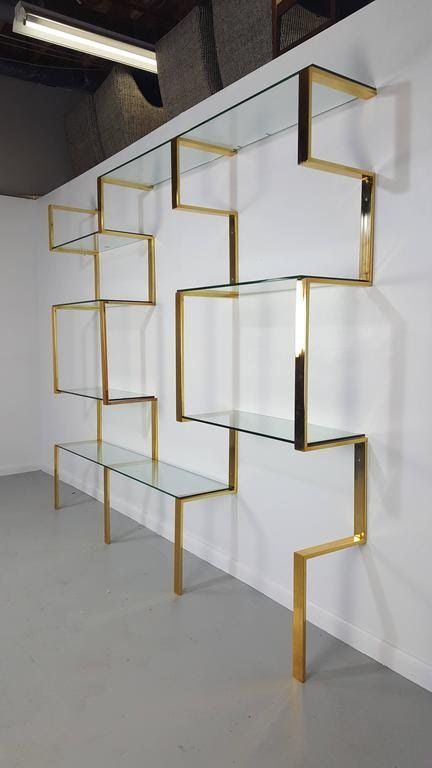 a shelf that has some glass shelves on it