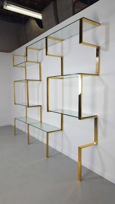 a shelf that has some glass shelves on it