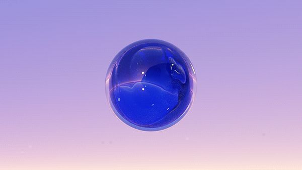 a blue glass ball floating in the air