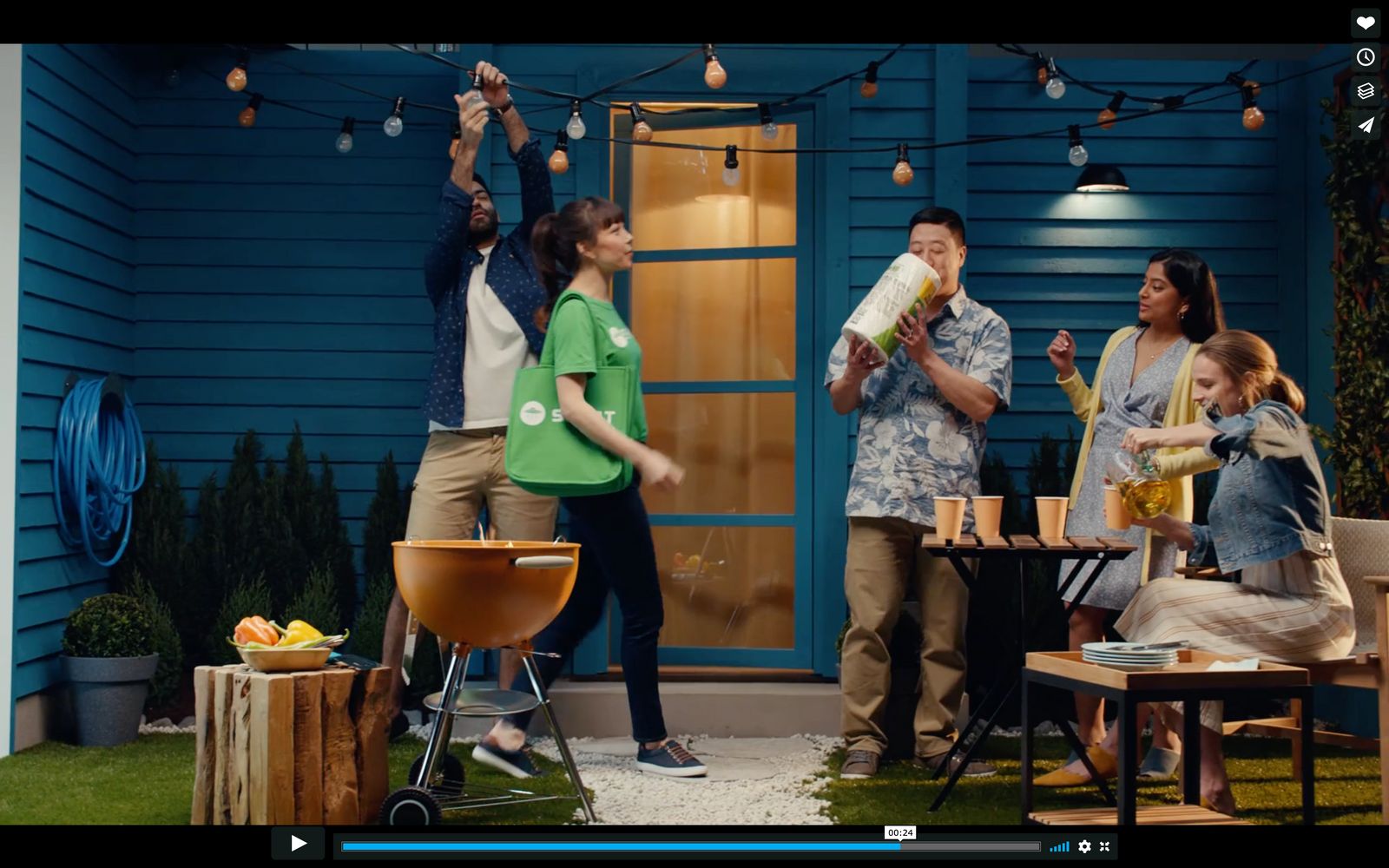 a group of people standing outside of a house