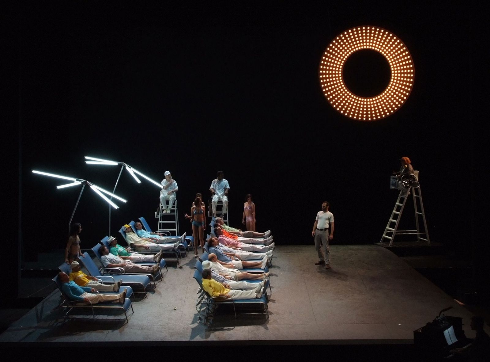 a group of people standing on top of a stage