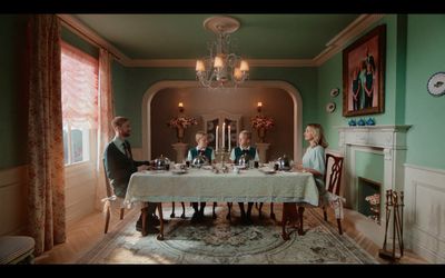 a group of people sitting around a table