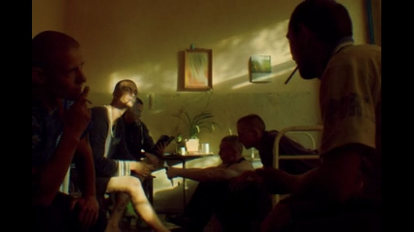 a group of people sitting in a room