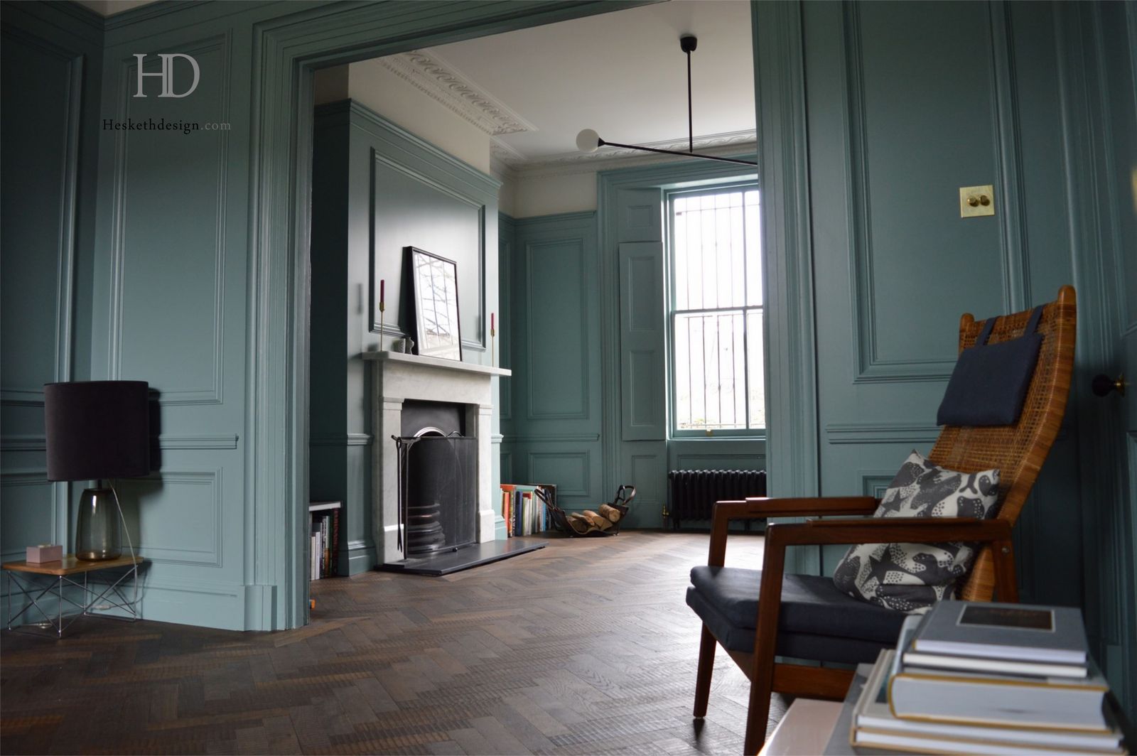 a living room filled with furniture and a fire place