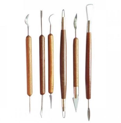 a group of tools that are on a white surface