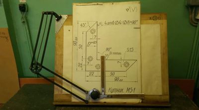 a drawing of a floor plan on a table