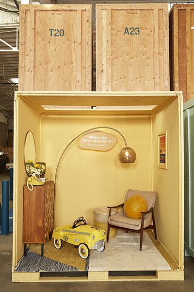 a room filled with furniture and a yellow chair