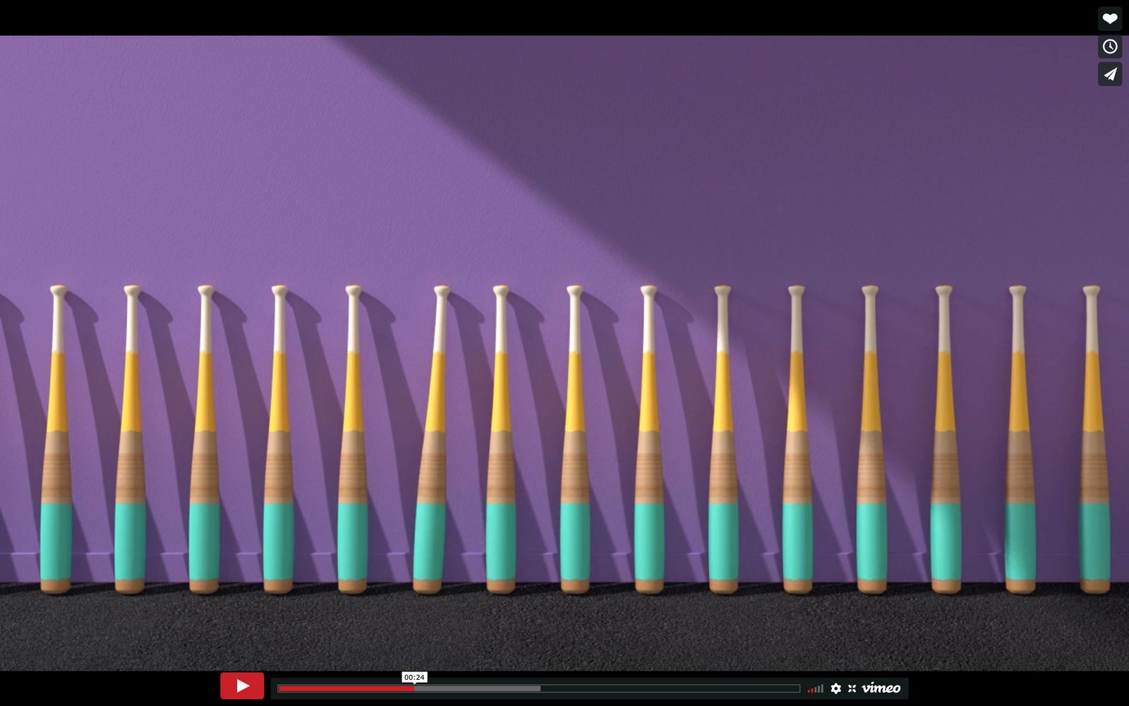 a row of blue and yellow toothbrushes against a purple wall